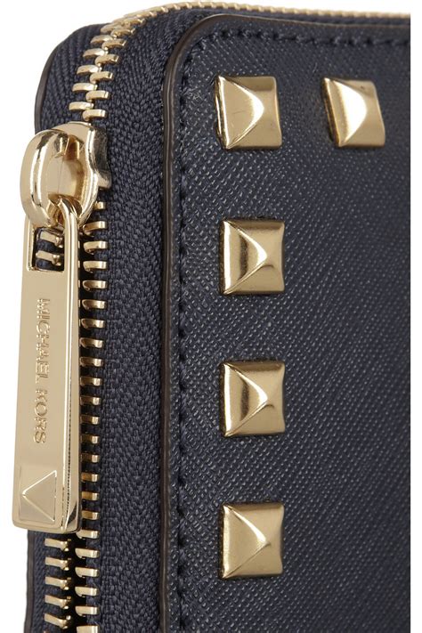 michael kors yellow studded wallet|Michael Kors studded wallet.